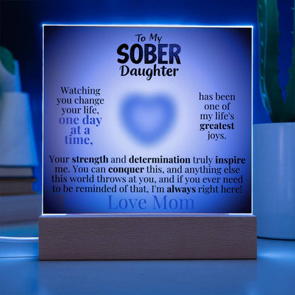 Light-up acrylic plaque with wooden base, blue glow border and heart message