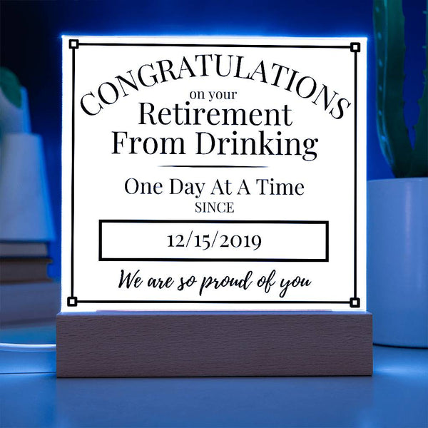 LED acrylic retirement plaque on wood base, “Congratulations” front text with glowing border