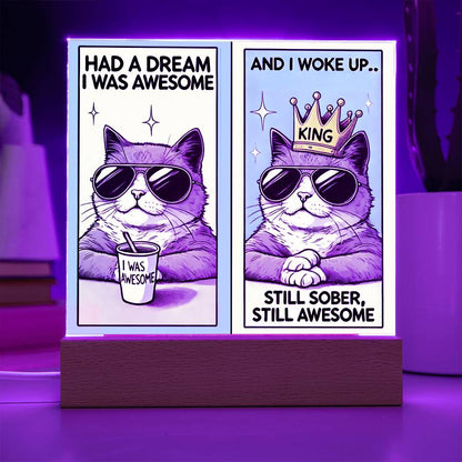 Two-panel LED tabletop sign showing crowned cat wearing sunglasses on a wooden base