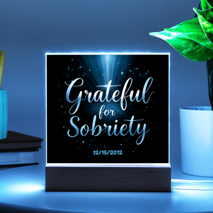 LED acrylic sobriety sign with glowing border, 'Grateful for Sobriety' and date on black
