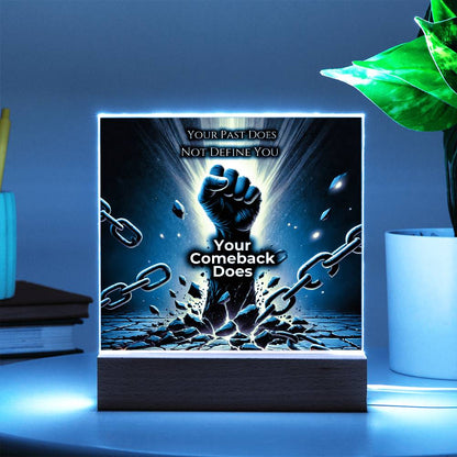 LED plaque with green glow border, fist and chains design on wood base