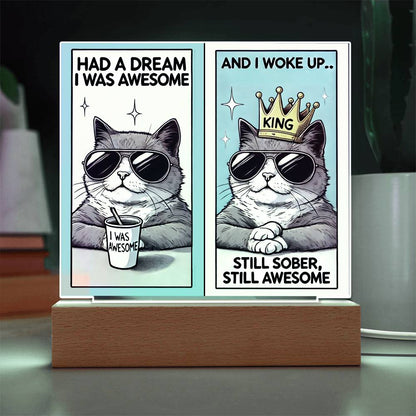 Two-panel LED tabletop sign showing cat with crown and sunglasses on wooden base