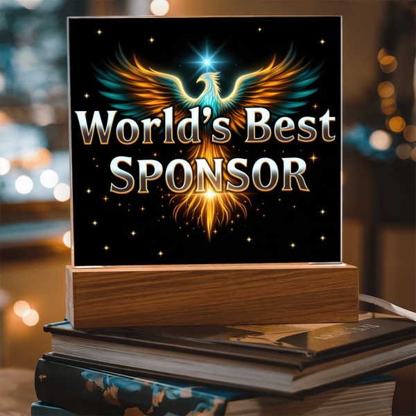 LED sponsor plaque with glowing phoenix and “World's Best Sponsor” text on wooden base