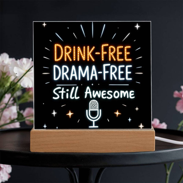 Glowing LED quote plaque: “DRINK-FREE DRAMA-FREE” with mic icon on wood base