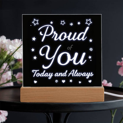 LED message plaque with glowing “Proud of You” and “Today and Always” on a wooden base