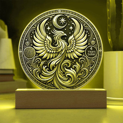 LED sobriety plaque with yellow glow, silver phoenix design, and “4 Years Sober” badge on wood base.
