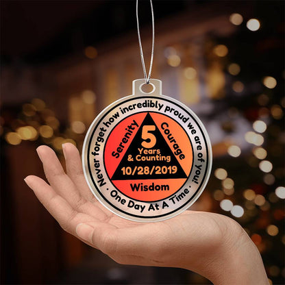 Round silver-tone sobriety date ornament with '5 Years & Counting' printed medallion on chain