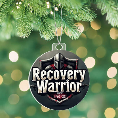 Acrylic Recovery Warrior round ornament with helmet graphic and date 11/02/22, on tree