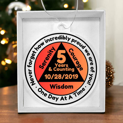Round silver-tone sobriety date ornament with '5 Years & Counting' printed medallion and chain