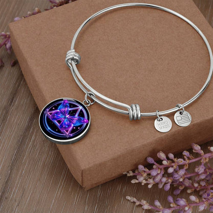 Butterfly recovery bracelet with silver bangle, butterfly charm, and engraved disc tags
