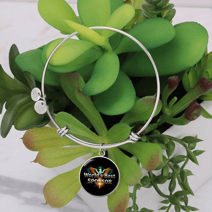 Silver bangle bracelet with round “World’s Best Sponsor” charm and two disc tags