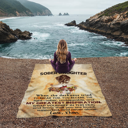 Recovery blanket spread out with 'To My Sober Daughter' quote and woman illustration