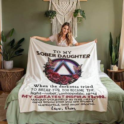 White throw blanket held open, with "To My Sober Daughter" text, A wreath graphic, and quote.