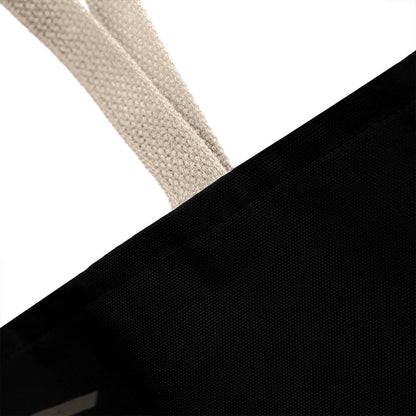 Black Halloween tote bag with natural woven handle strap detail