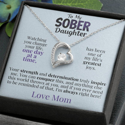 Heart pendant necklace with silver-tone chain and sparkling heart charm