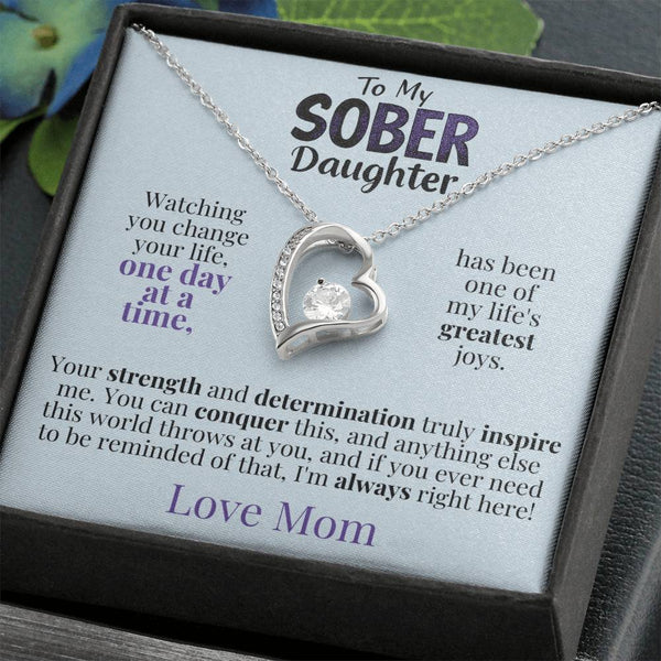 Heart pendant necklace with silver-tone chain and sparkling heart charm