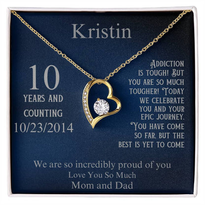 Gold heart pendant necklace in gift box, with name and 10 years date 10/23/2014