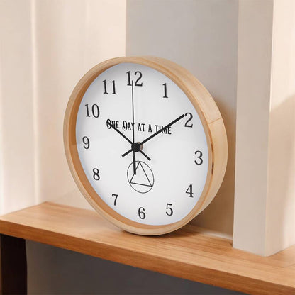 Recovery wall clock, natural wood frame, white face, black numbers and hands