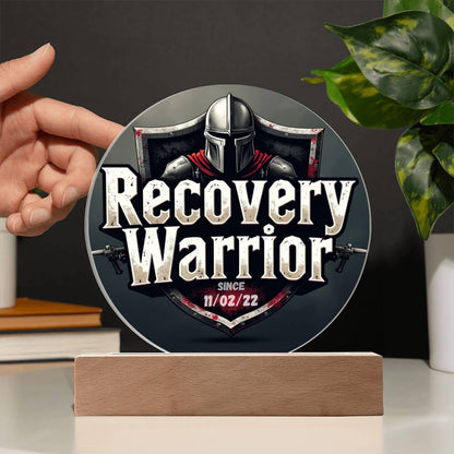 LED circle plaque with knight helmet graphic, “Recovery Warrior,” on wooden base