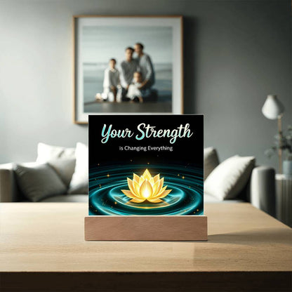 LED strength plaque with “Your Strength” and glowing lotus in blue ring, wood base
