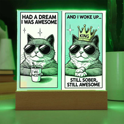 Two-panel LED tabletop sign with cat wearing sunglasses and crown, on wooden base