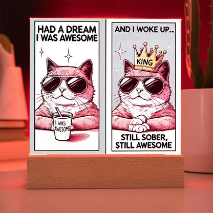 Two-panel LED tabletop sign with crowned sunglasses cat artwork, on wooden base