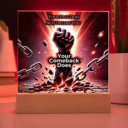 LED plaque with red glow border, fist and chains graphic on wood base
