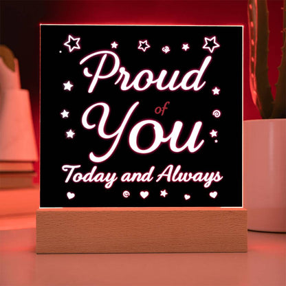 LED message plaque showing glowing “Proud of You” and “Today and Always” on a wooden base