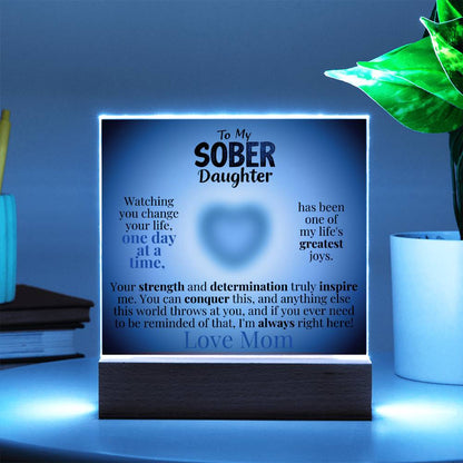 Light-up acrylic plaque with wooden base, blue glow border and heart message