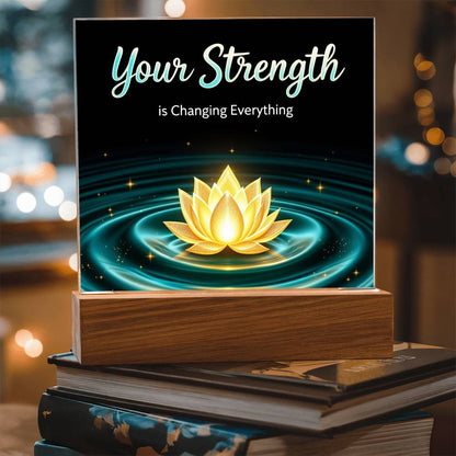 LED strength plaque with glowing lotus and “Your Strength” text on wood base