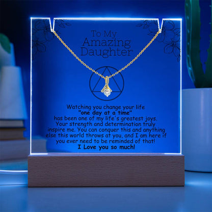 LED acrylic plaque with necklace, blue glowing border, heart pendant, dark wooden base
