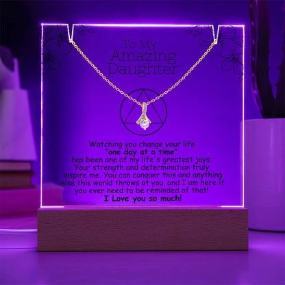 LED acrylic plaque with necklace, purple glowing border, heart pendant, dark wooden base