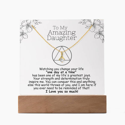 Acrylic plaque with necklace, white background text and heart pendant on chain