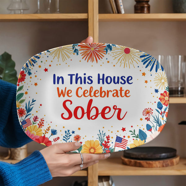 Oval celebration platter with “In This House We Celebrate Sober” and colorful fireworks flowers