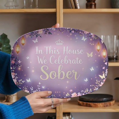 Purple oval gift tray with 'In This House We Celebrate Sober' and butterfly-flower pattern