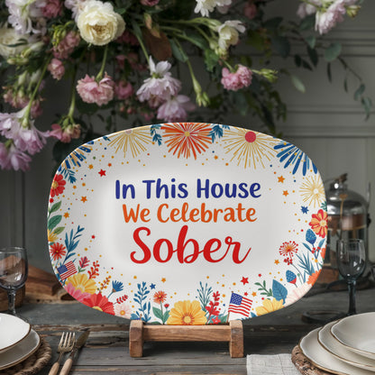 Oval celebration platter with “In This House We Celebrate Sober” and colorful garden fireworks