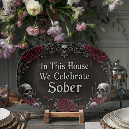 Oval serving platter with gothic quote, skulls, and red roses on a small wooden stand