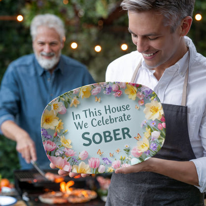 Serving platter with floral border and teal center text: “In This House We Celebrate SOBER”