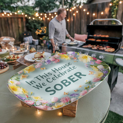 Serving platter with floral border and teal center text: “In This House We Celebrate SOBER”