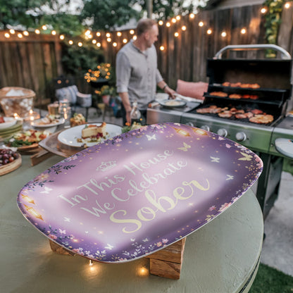 Purple oval gift tray with 'In This House We Celebrate Sober' text and butterfly border