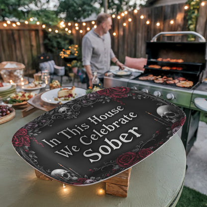 Oval serving platter with gothic quote and skulls, with red roses on dark base