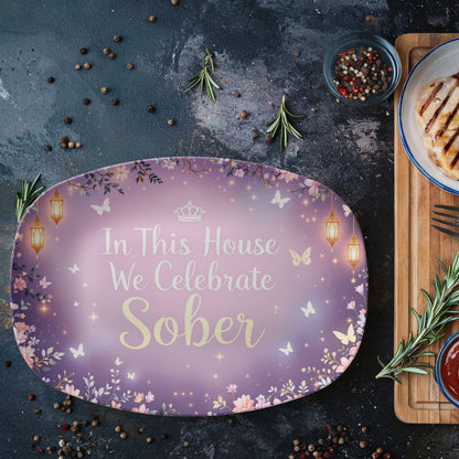 Purple oval gift tray with 'In This House We Celebrate Sober' and butterfly-lantern border