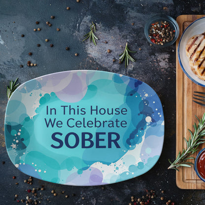 Oval serving platter with blue abstract border and 'In This House We Celebrate SOBER' text.
