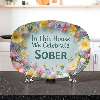 Serving platter with floral border and teal center text: “In This House We Celebrate SOBER”