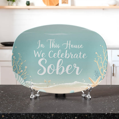 Seafoam oval platter on display stand, printed “In This House We Celebrate Sober”