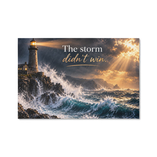Rectangular lighthouse storm wall art canvas with ocean waves and text, “The storm didn’t win.”