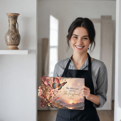 Custom recovery date canvas held by a smiling woman, showing butterfly and recovery quote