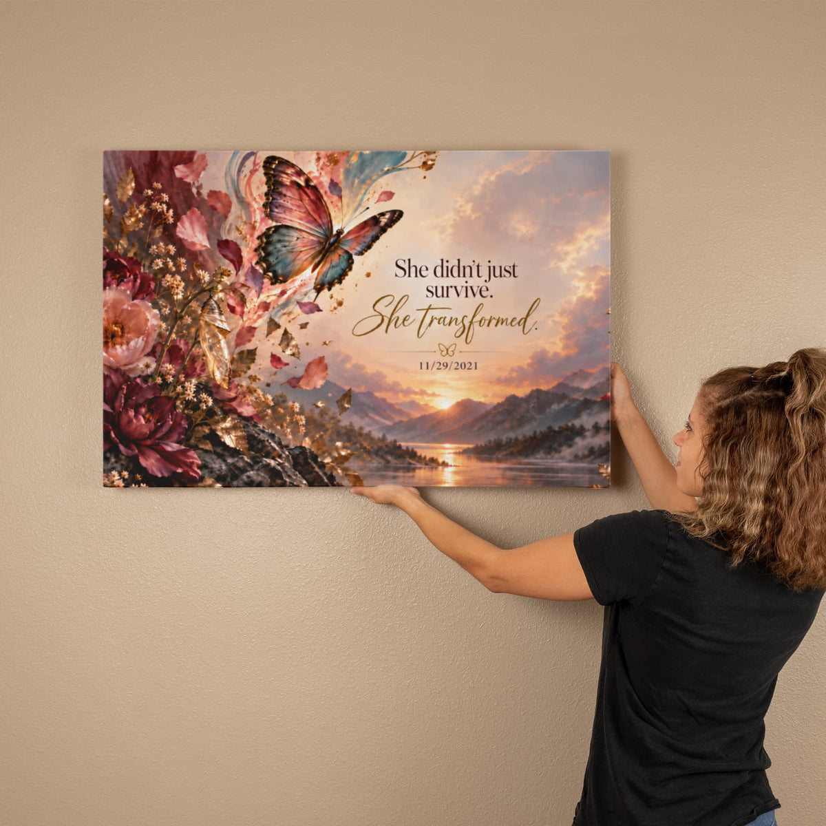 Custom recovery date canvas held up to a wall with butterfly and 'She transformed' text