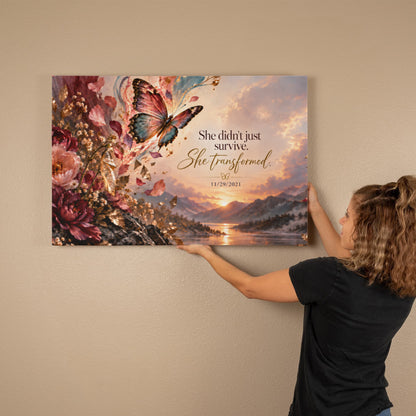 Custom recovery date canvas held up to a wall with butterfly and 'She transformed' text