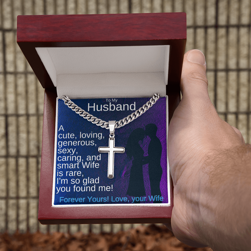 Silver-tone chain necklace with cross pendant and engraved name plate, held up
